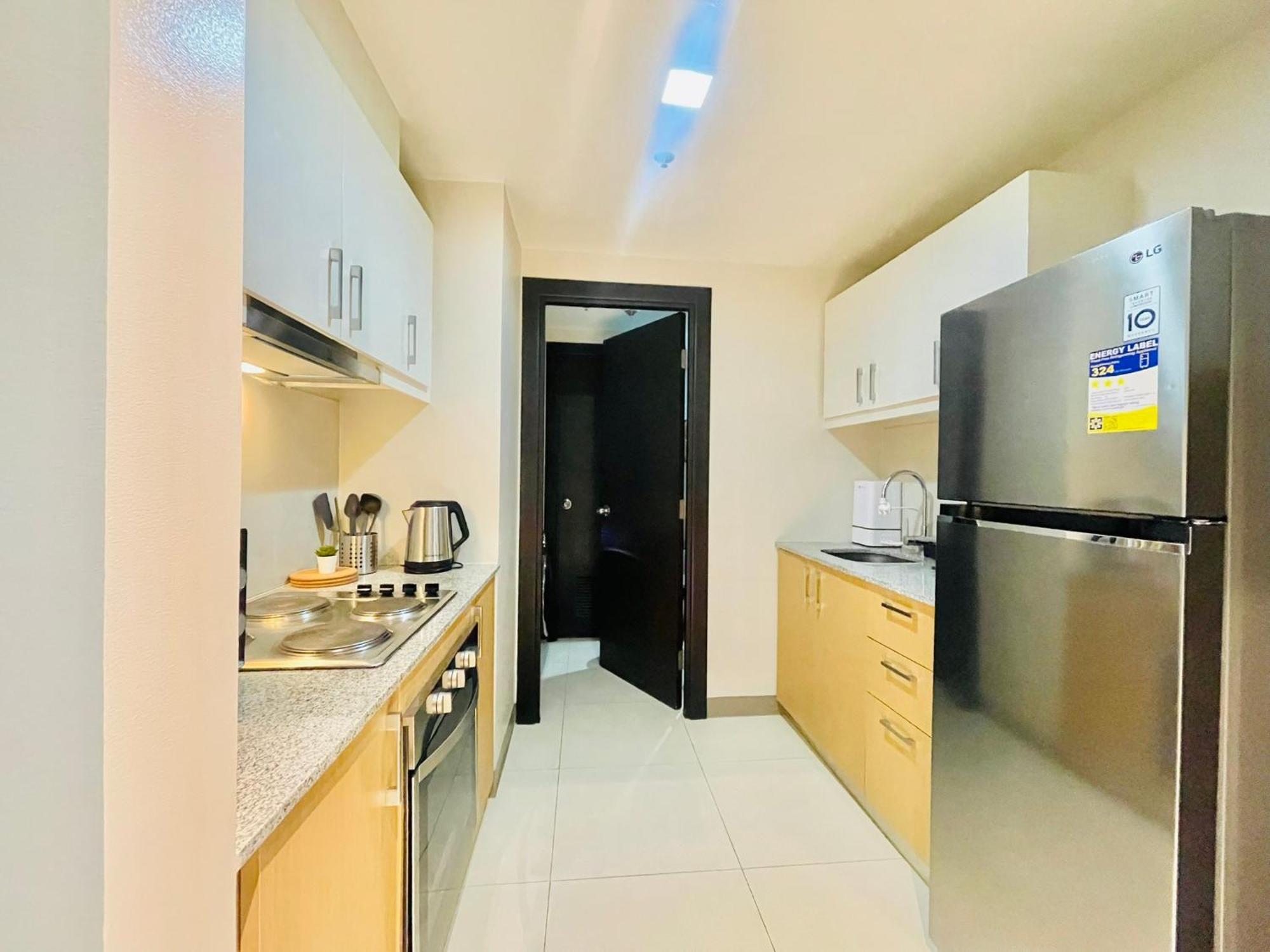 تاغويغ Uptown Parksuites Bgc المظهر الخارجي الصورة