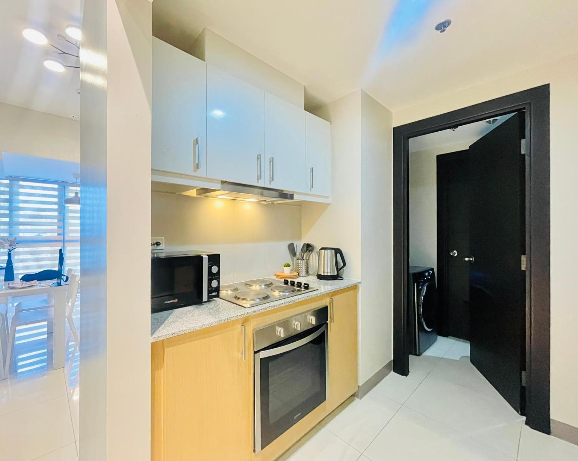 تاغويغ Uptown Parksuites Bgc المظهر الخارجي الصورة