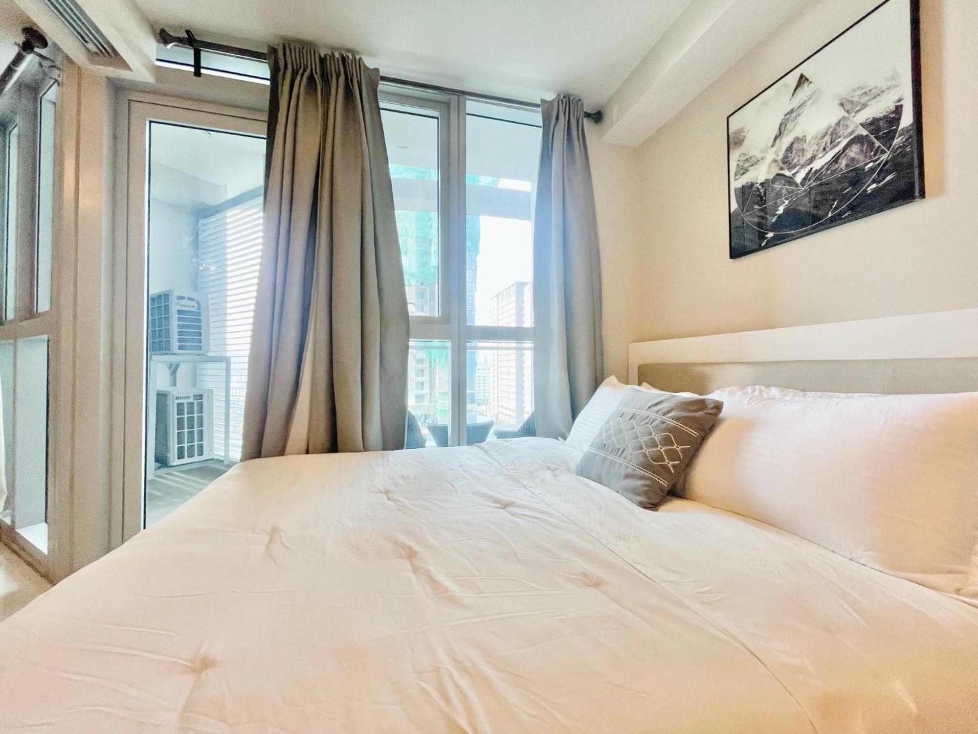 تاغويغ Uptown Parksuites Bgc المظهر الخارجي الصورة